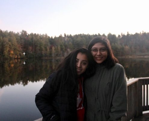 Two Teenage Members of Substance Free Youth Standing In Front of a Lake